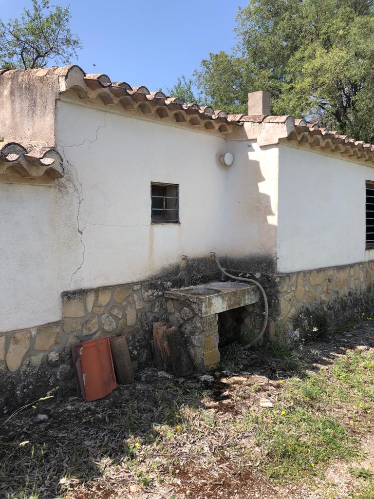 Project in paradise, two houses plus stables and land